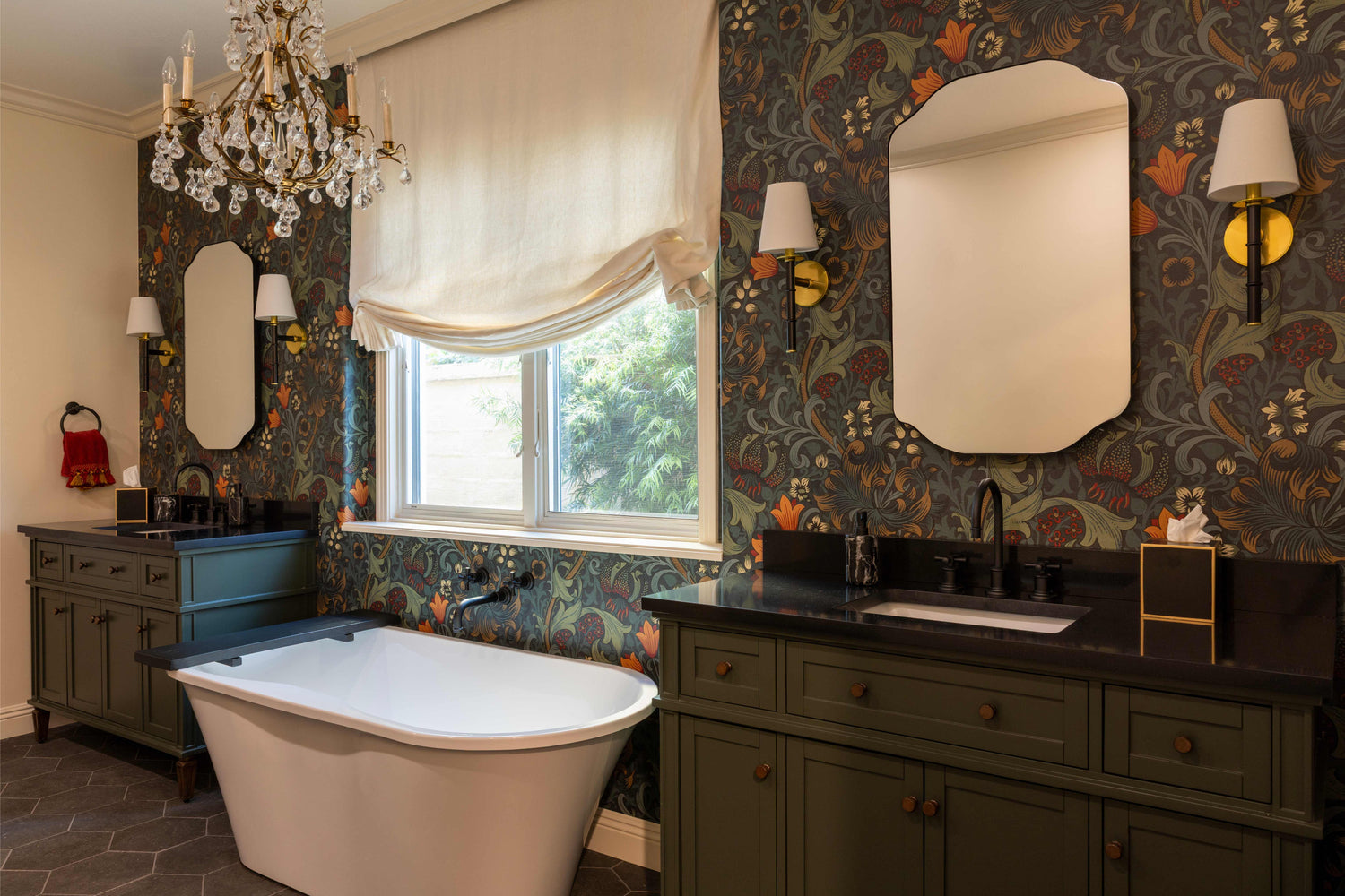 Luxurious bathroom with freestanding bathtub, dark wood cabinetry, and ornate wallpaper.