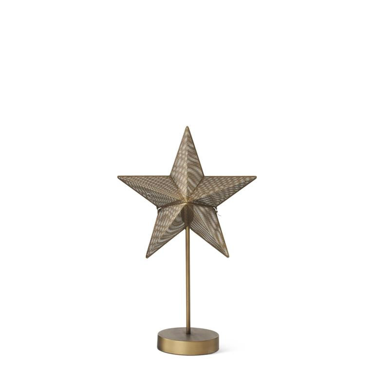 Decorative star table lamp with a metallic golden brass base on a white background