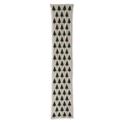 A long, narrow table runner featuring a vertical pattern of small dark green pine trees, shown flat against a white background.