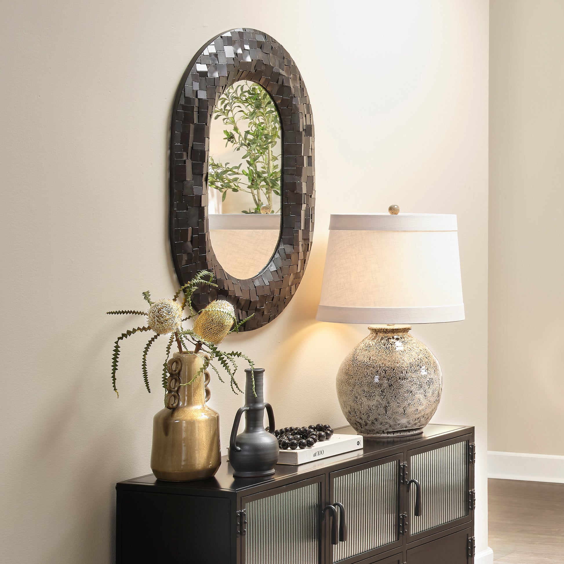 Enigma Iron Oval Wall Mirror by Jamie Young
