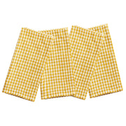 Four folded yellow and white gingham lined checkered kitchen napkins by Blue Pheasant arranged on a plain white background.