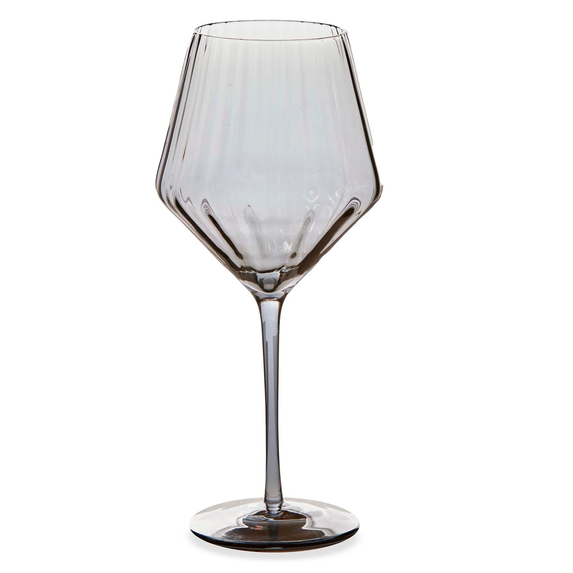 Smokey colored wine glass on a white background