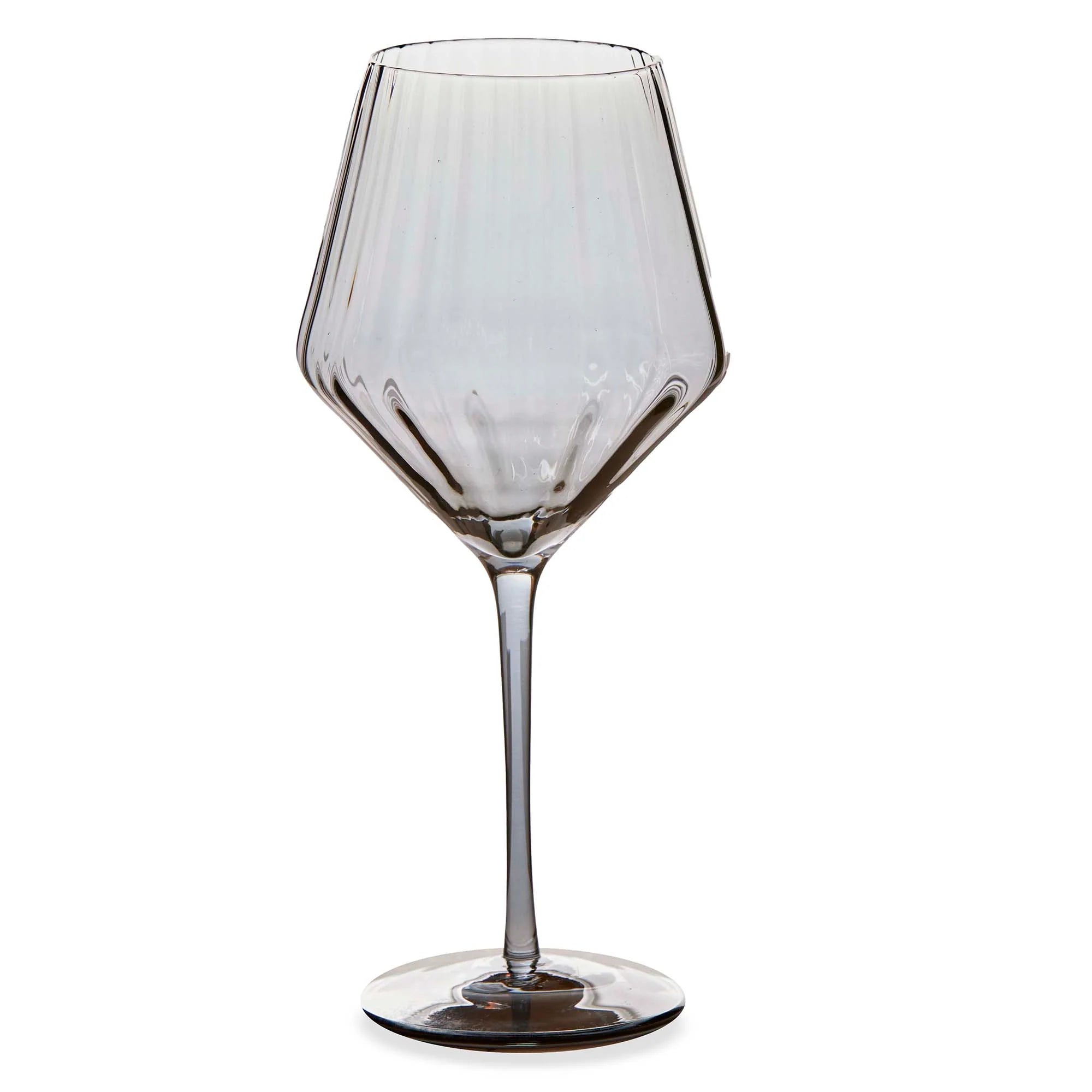 Smokey colored wine glass on a white background