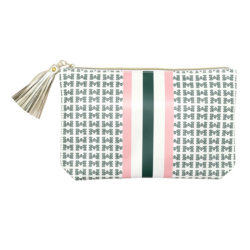 Pouch with patterned design and tassel on a white background