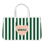 Green and white striped tote bag with a pink heart and 'MAHJ' text on a white background
